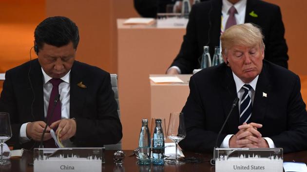 China's President Xi Jinping and US President Donald Trump attend the G20 summit in Hamburg, Germany, on July 7. (AFP File) China's President Xi Jinping and US President Donald Trump attend the G20 summit in Hamburg, Germany, on July 7. (AFP File)
