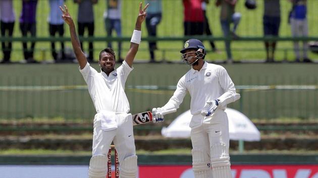 Pallekele : India's Hardik Pandya, left, gestures towards team's dressing room as he celebrates after scoring his century. (AP)