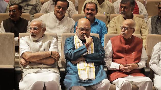 Indian Prime Minister Narendra Modi, left, Bharatiya Janata Party or BJP President Amit Shah, centre, and senior leader L.K.Advani, right, sit during parliamentary party meeting in New Delhi, India, Thursday, Aug. 10, 2017. Shah, who completed three years of party presidentship won the upper house election of the Indian parliament from Gujarat. (Manish Swarup/AP)