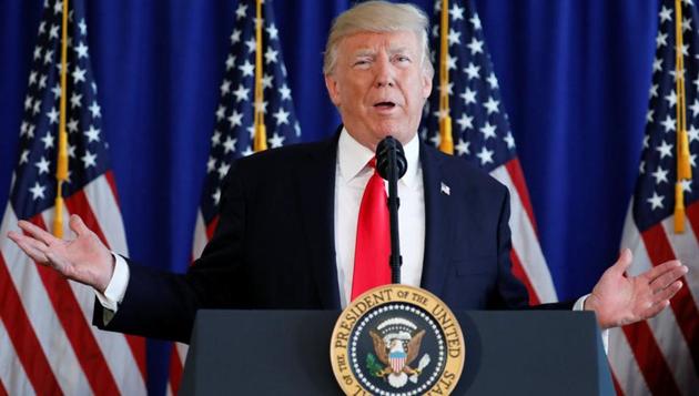 US President Donald Trump delivers remarks before signing the Veterans Affairs Choice and Quality Employment Act at Trump's golf estate in Bedminster, New Jersey, US August 12, 2017. (REUTERS) US President Donald Trump delivers remarks before signing the Veterans Affairs Choice and Quality Employment Act at Trump's golf estate in Bedminster, New Jersey, US August 12, 2017. (REUTERS)