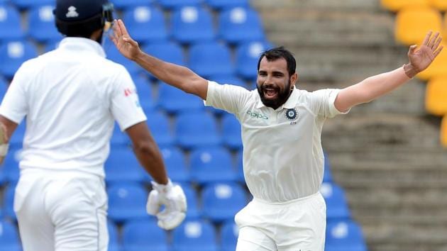 Mohammed Shami (R) celebrates after he dismissed Sri Lankan cricketer Kusal Mendis during the third day of the third and final Test match between Sri Lanka and India. (AFP) Mohammed Shami (R) celebrates after he dismissed Sri Lankan cricketer Kusal Mendis during the third day of the third and final Test match between Sri Lanka and India. (AFP)