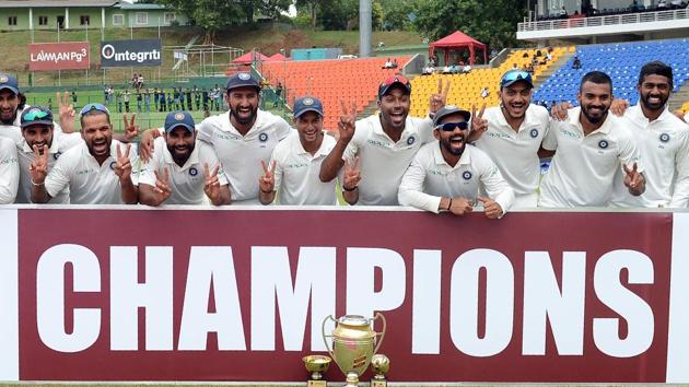 Indian cricketers pose after victory after victory in the third day of the final Test match between Sri Lanka and India at the Pallekele International Cricket Stadium. (AFP) Indian cricketers pose after victory after victory in the third day of the final Test match between Sri Lanka and India at the Pallekele International Cricket Stadium. (AFP)
