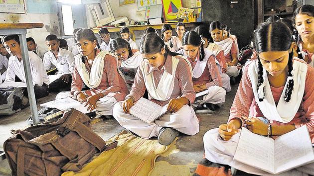 Students taking classes in a room that also serves as a library and science room at Government High School, Bhamian Kalan, in Ludhiana. (Gurminder Singh/HT) Students taking classes in a room that also serves as a library and science room at Government High School, Bhamian Kalan, in Ludhiana. (Gurminder Singh/HT)