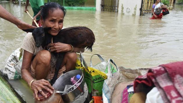 Additional personnel of national and state disaster response forces were deployed in the affected districts to rescue people. According to Assam State Disaster Management Authority (ASDMA), more than 1.83 lakh people displaced in the recent floods are taking shelter in 678 relief camps across the state. (Biju Boro/AFP)