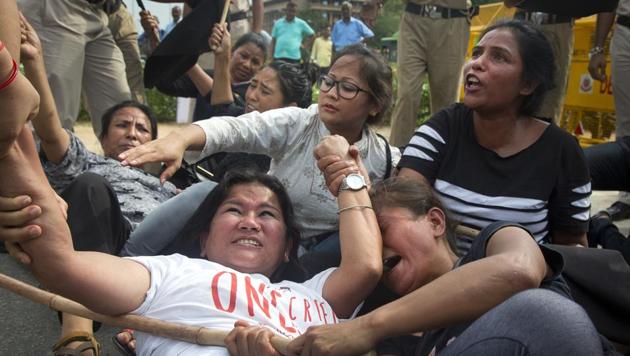 Gorkhaland activists resist detention by police during a protest near Parliament recently. (AP photo) Gorkhaland activists resist detention by police during a protest near Parliament recently. (AP photo)