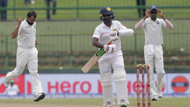 Mohammed Shami then struck twice, removing Kusal Mendis and nightwatchman Malinda Pushpakumara. (AP) Mohammed Shami then struck twice, removing Kusal Mendis and nightwatchman Malinda Pushpakumara. (AP)