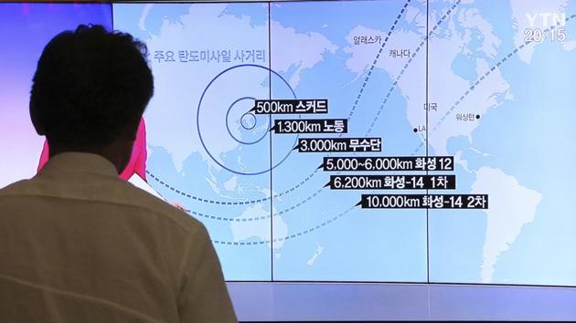 In this Aug. 10, 2017 photo, a man watches a TV screen showing a local news program reporting on North Korea's missiles, at the Seoul Railway Station in Seoul, South Korea. (AP) In this Aug. 10, 2017 photo, a man watches a TV screen showing a local news program reporting on North Korea's missiles, at the Seoul Railway Station in Seoul, South Korea. (AP)