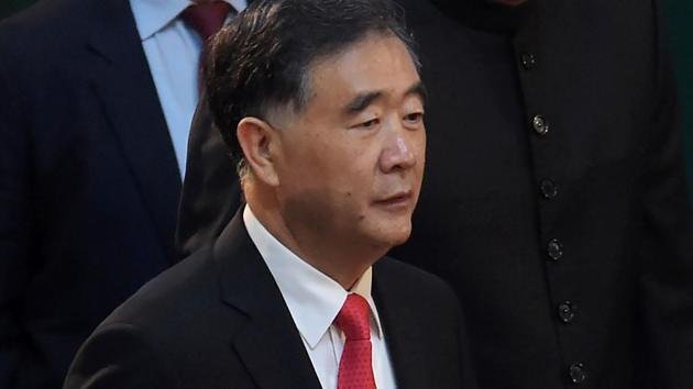 Chinese vice premier Wang Yang (centre) is flanked by Pakistan's Prime Minister Shahid Khaqan Abbasi (right) as they arrive to attend a flag hoisting ceremony in Islamabad on August 14, 2017. (AFP) Chinese vice premier Wang Yang (centre) is flanked by Pakistan's Prime Minister Shahid Khaqan Abbasi (right) as they arrive to attend a flag hoisting ceremony in Islamabad on August 14, 2017. (AFP)
