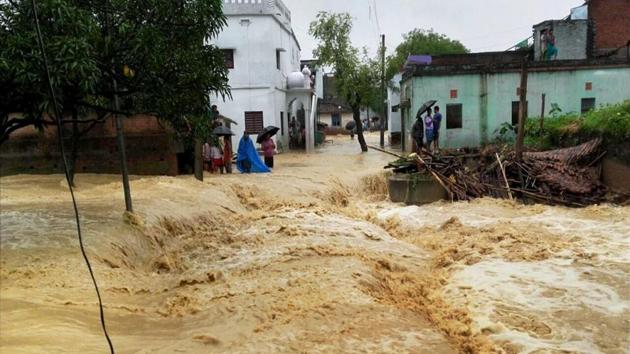 Nearly 20 lakh people have been severely affected due to flood in Bihar. (PTi Photo) Nearly 20 lakh people have been severely affected due to flood in Bihar. (PTi Photo)