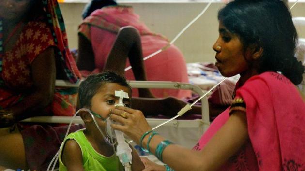 Children in the encephalitis ward at the Baba Raghav Das Medical College Hospital, in Gorakhpur district on Monday. (PTI Photo) Children in the encephalitis ward at the Baba Raghav Das Medical College Hospital, in Gorakhpur district on Monday. (PTI Photo)