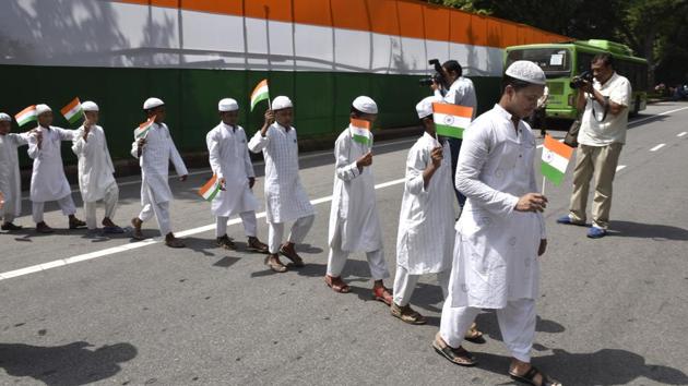 Children participated in flag hoisting ceremony at AICC Office on the occasion of Independence Day celebration in New Delhi. (Arvind Yadav/HT PHOTO) Children participated in flag hoisting ceremony at AICC Office on the occasion of Independence Day celebration in New Delhi. (Arvind Yadav/HT PHOTO)