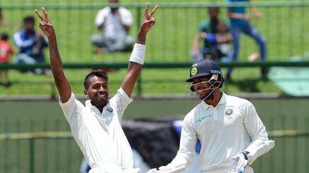 Hardik Pandya celebrates after scoring his maiden century for India against Sri Lanka.(AFP)
