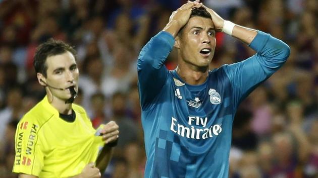 Real Madrid's Cristiano Ronaldo, right, reacts after Referee Ricardo de Burgos shows a second yellow card during the Spanish Supercup match. (AP) Real Madrid's Cristiano Ronaldo, right, reacts after Referee Ricardo de Burgos shows a second yellow card during the Spanish Supercup match. (AP)
