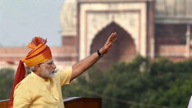 Prime Minister Narendra Modi waves at the gathering after addressing the Nation from the ramparts of Red Fort in New Delhi on the occasion of 71st Independence Day on Tuesday.(PTI Photo)