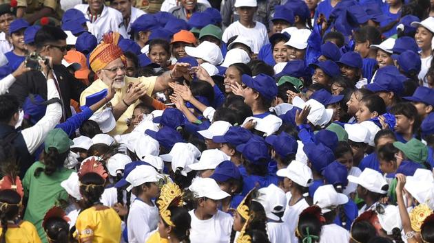After concluding his speech the Prime Minister then came down to interact with children who had gathered at the Red Fort as part of the official programme. (Raj K Raj / HT Photo)
