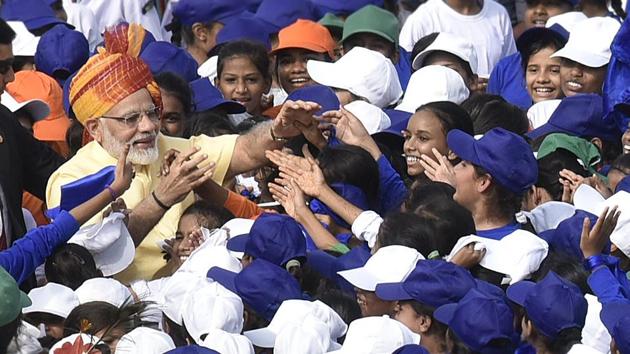 Prime Minister Narendra Modi interacts with children during Independence Day celebration at the Red Fort in New Delhi. India celebrates its 71st Independence Day today with the Prime Minister hoisting the tricolor from the ramparts of Red Fort and celebratory programmes held across the country. (Raj K Raj/HT PHOTO) Prime Minister Narendra Modi interacts with children during Independence Day celebration at the Red Fort in New Delhi. India celebrates its 71st Independence Day today with the Prime Minister hoisting the tricolor from the ramparts of Red Fort and celebratory programmes held across the country. (Raj K Raj/HT PHOTO)