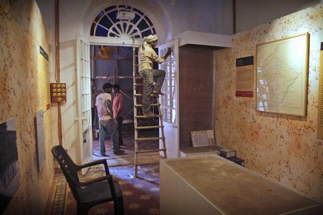 In this Aug. 12, 2017 photo, a worker cleans a door in one of the 14 galleries of the Partition Museum that is set to open later this week in Amritsar, India, 32 kilometres (20 miles) from border with Pakistan. India's first partition museum tells the stories of those who survived the chaos and bloodshed 7 decades ago. (AP Photo) In this Aug. 12, 2017 photo, a worker cleans a door in one of the 14 galleries of the Partition Museum that is set to open later this week in Amritsar, India, 32 kilometres (20 miles) from border with Pakistan. India's first partition museum tells the stories of those who survived the chaos and bloodshed 7 decades ago. (AP Photo)