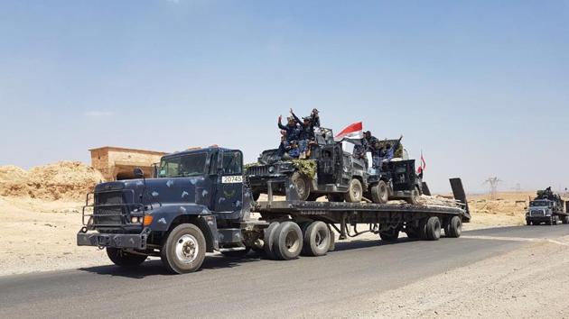 A handout picture released by the Iraqi Federal Police on August 15, 2017, shows Iraqi armoured units headed for the town of Tal Afar, the main remaining Islamic State (IS) group stronghold in the northern part of the country. (AFP Photo) A handout picture released by the Iraqi Federal Police on August 15, 2017, shows Iraqi armoured units headed for the town of Tal Afar, the main remaining Islamic State (IS) group stronghold in the northern part of the country. (AFP Photo)