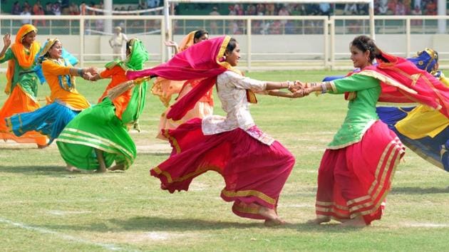 Students perform bhangra during Independence Day celebrations at Guru Gobind Singh Stadium in Jalandhar. (Pradeep Pandit/HT Photo) Students perform bhangra during Independence Day celebrations at Guru Gobind Singh Stadium in Jalandhar. (Pradeep Pandit/HT Photo)