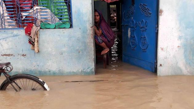 Almost 3,000 houses have been destroyed by the floods with another 3,700 structures including schools, hospitals and government offices left in a state of disarray. (Sajan Malla / AFP)