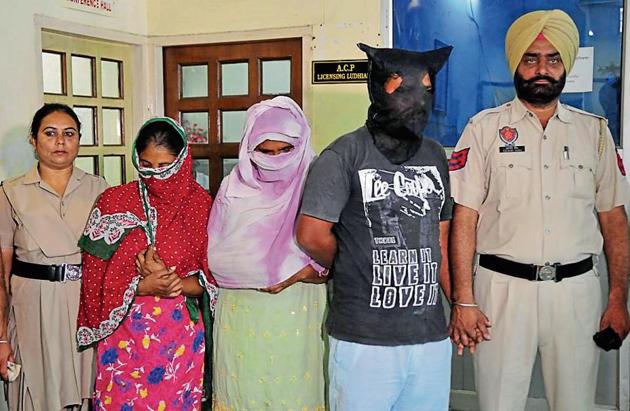 The victim’s wife, mother and brother in police custody in Ludhiana on Monday. (Gurminder Singh/HT) The victim’s wife, mother and brother in police custody in Ludhiana on Monday. (Gurminder Singh/HT)