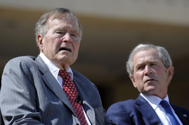 Former US Presidents George HW Bush and George W Bush in Dallas, Texas on April 25, 2013. (AFP) Former US Presidents George HW Bush and George W Bush in Dallas, Texas on April 25, 2013. (AFP)