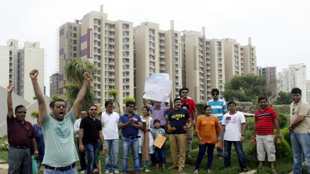 Buyers protest against Unitech at Gurgaon’s Sector 33 in 2014.(HT File Photo)