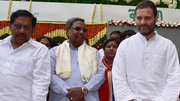 Congress vice-president Rahul Gandhi, Karnataka chief minister Siddaramaiah (centre) and state ministers G Parameshwara (left) attend the opening of the subsidised eatery ‘Indira Canteen’, named after the late Indian prime minister Indira Gandhi, in Bangalore on Wednesday. (AFP Photo) Congress vice-president Rahul Gandhi, Karnataka chief minister Siddaramaiah (centre) and state ministers G Parameshwara (left) attend the opening of the subsidised eatery ‘Indira Canteen’, named after the late Indian prime minister Indira Gandhi, in Bangalore on Wednesday. (AFP Photo)