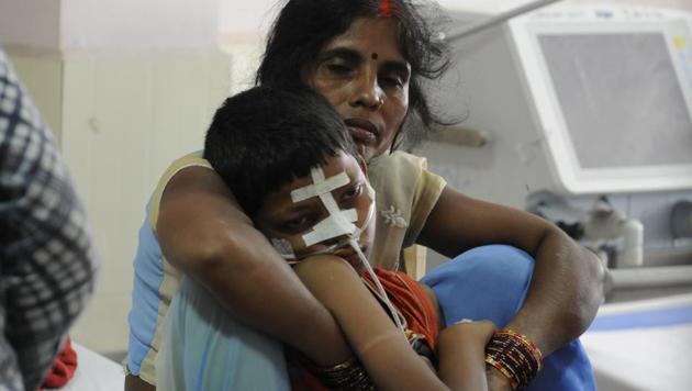 A child admitted into BRD Medical College hospital’s encephalitis ward.(Deepak Gupta/HT) A child admitted into BRD Medical College hospital’s encephalitis ward.(Deepak Gupta/HT)