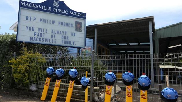 A memorial is dispalyed outside Macksville Public School during the Funeral Service for Phillip Hughes on December 3, 2014 in Macksville, Australia. Australian cricketer Phil Hughes passed away, aged 25, as a result of head injuries sustained during the Sheffield Shield match between South Australia and New South Wales at the SCG on November 25, 2014. (Getty Images) A memorial is dispalyed outside Macksville Public School during the Funeral Service for Phillip Hughes on December 3, 2014 in Macksville, Australia. Australian cricketer Phil Hughes passed away, aged 25, as a result of head injuries sustained during the Sheffield Shield match between South Australia and New South Wales at the SCG on November 25, 2014. (Getty Images)
