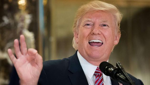 US President Donald Trump speaks following a meeting on infrastructure at Trump Tower, August 15, 2017 in New York City. (AFP) US President Donald Trump speaks following a meeting on infrastructure at Trump Tower, August 15, 2017 in New York City. (AFP)