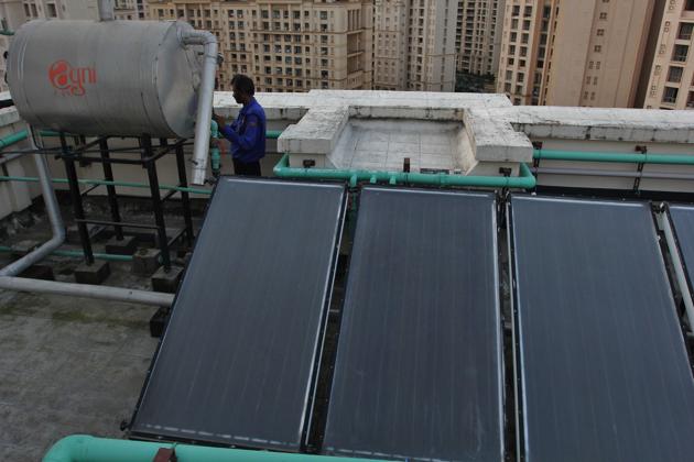 Solar panels mounted atop a high-rise in Thane. (Praful Gangurde) Solar panels mounted atop a high-rise in Thane. (Praful Gangurde)