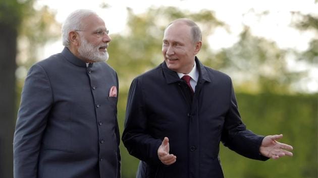 Prime Minister Narendra Modi with Russian President Vladimir Putin at the St. Petersburg International Economic Forum in Russia in June 2017.(AP File Photo)