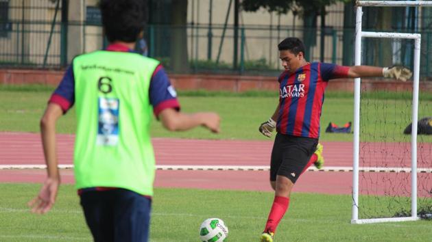 A player takes a shot during a pre-qualifier match at SARE Homes HT GIFA.