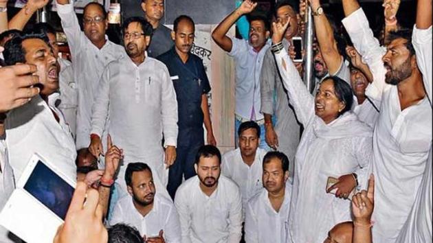 RJD workers, led by former deputy chief minister Tejashwi Prasad Yadav, staging dharna at Bhagalpur, on Thursday. (HT photo) RJD workers, led by former deputy chief minister Tejashwi Prasad Yadav, staging dharna at Bhagalpur, on Thursday. (HT photo)