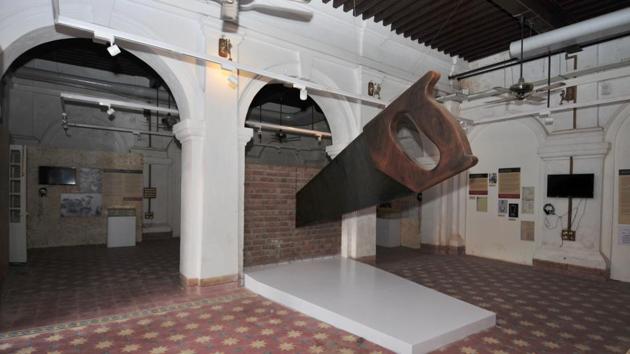 A giant saw installation cuts through a brick wall at the Partition Museum in Amritsar. The Partition Museum is a chronicle to an event that lacerated a nation and is an attempt at bridging the divide of 1947. Put together through individual efforts, supported by the government in giving this colonial building for display, the museum is a work in progress with material related to 1947 trickling in as people share stories and mementos related to the troubled times. (Ravi Kumar / HT Photo)