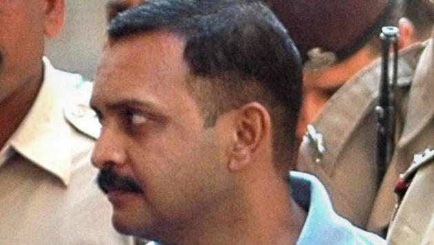 Malegaon blast case accused Lt Col Shrikant Prasad Purohit being taken to a session court in Mumbai. (PTI File Photo) Malegaon blast case accused Lt Col Shrikant Prasad Purohit being taken to a session court in Mumbai. (PTI File Photo)