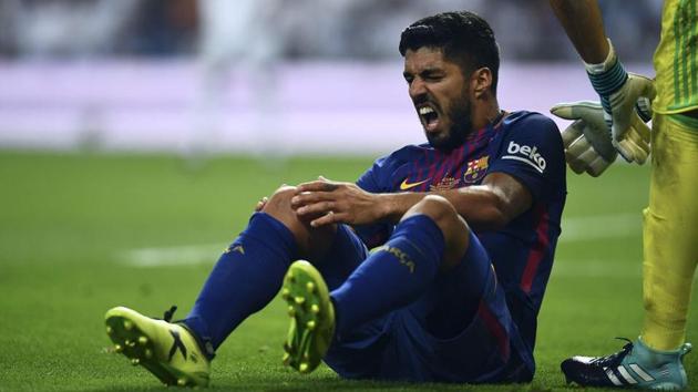 Luis Suarez was injured in the final minutes of Wednesday’s 2-0 loss at Real Madrid in the second leg of the Spanish Super Cup (AFP) Luis Suarez was injured in the final minutes of Wednesday’s 2-0 loss at Real Madrid in the second leg of the Spanish Super Cup (AFP)