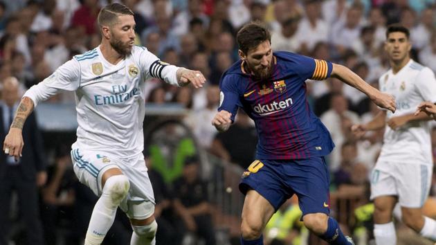 Messi was later seen clashing with Real skipper Sergio Ramos (L) after the latter proceeded to offer the ball to the Argentine forward before throwing it away. (AFP)
