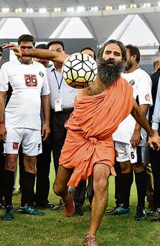 Kicking it: Baba Ramdev during a charitable football match between Indian Bollywood actors and Indian Parliamentarians in New Delhi on July 24, 2016.(Vipin Kumar/HT PHOTO)