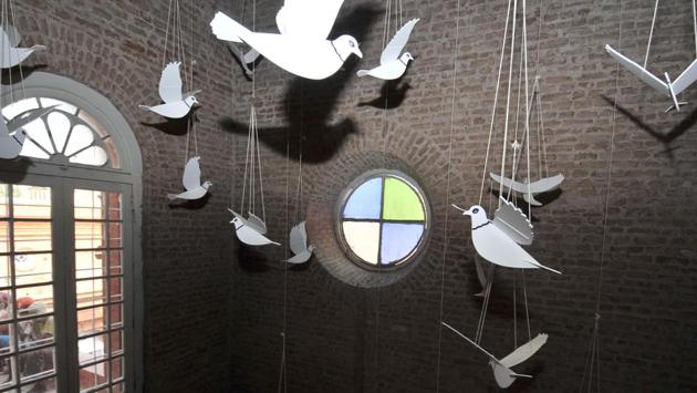 Paper hangings of migratory birds lead viewers to the Hall of Hope which houses a huge Tree of Hope fashioned out of barbed wire by designer Neeraj Sahai. People visiting the museum will be able to hang green leaves on the interactive piece turning the whole tree green, according to Sahai. (Ravi Kumar / HT Photo)