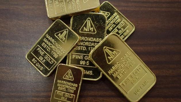 Gold biscuits are seen in this picture illustration taken inside a jewellery showroom in Mumbai June 4, 2013. (Reuters File Photo) Gold biscuits are seen in this picture illustration taken inside a jewellery showroom in Mumbai June 4, 2013. (Reuters File Photo)