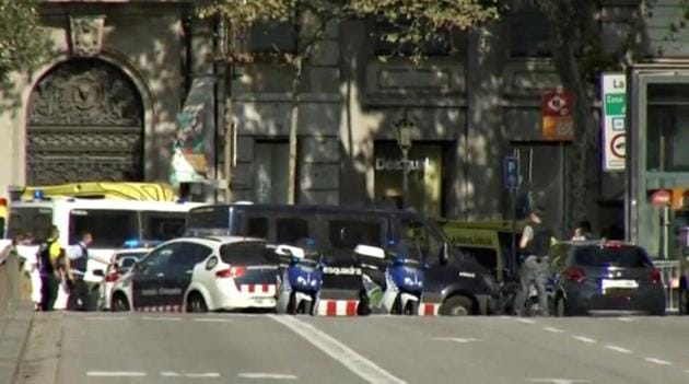 A still image from video shows a police cordon on a street in Barcelona, Spain following a van crash August 17, 2017. (REUTERS) A still image from video shows a police cordon on a street in Barcelona, Spain following a van crash August 17, 2017. (REUTERS)