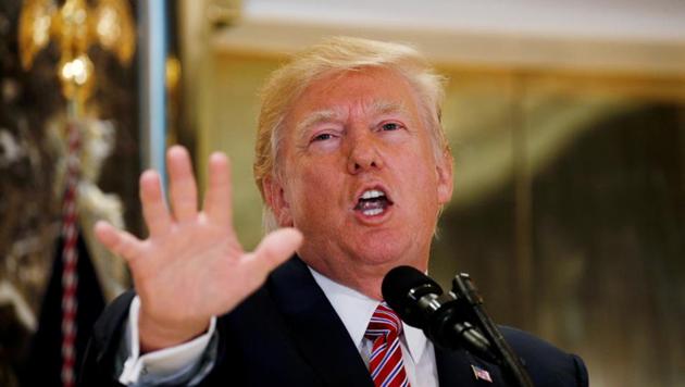 U.S. President Donald Trump speaks about the violence, injuries and deaths at the "Unite the Right" rally in Charlottesville as he talks to the media in the lobby of Trump Tower in Manhattan, New York, U.S., August 15, 2017. (REUTERS Photo) U.S. President Donald Trump speaks about the violence, injuries and deaths at the "Unite the Right" rally in Charlottesville as he talks to the media in the lobby of Trump Tower in Manhattan, New York, U.S., August 15, 2017. (REUTERS Photo)