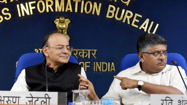 Union Minister for Finance, Defence and Corporate Affairs, Arun Jaitley with Union Law Minister Ravi Shankar Prasad at a press conference after a Cabinet meeting in New Delhi on Wednesday. (PTI Photo) Union Minister for Finance, Defence and Corporate Affairs, Arun Jaitley with Union Law Minister Ravi Shankar Prasad at a press conference after a Cabinet meeting in New Delhi on Wednesday. (PTI Photo)