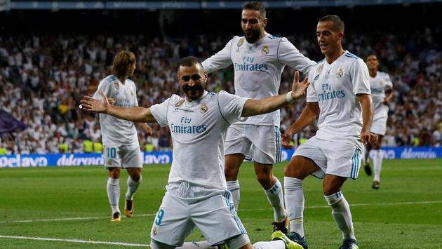 Karim Benzema then finished from close range to double Real’s lead in the first half. (REUTERS)