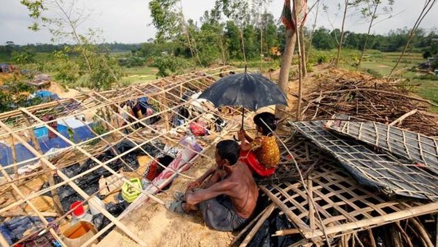 Rohingya refugees sit in front of their house which has been destroyed by Cyclone Mora at the Balukhali Makeshift Refugee Camp in Cox’s Bazar, Bangladesh May 31, 2017. (Reuters File Photo) Rohingya refugees sit in front of their house which has been destroyed by Cyclone Mora at the Balukhali Makeshift Refugee Camp in Cox’s Bazar, Bangladesh May 31, 2017. (Reuters File Photo)