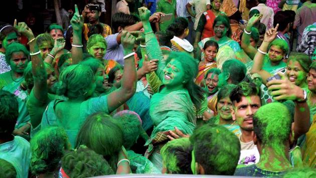 Trinamool Congress (TMC) supporters celebrate the party's win in Kupars Municipality election in Nadia district of West Bengal on August 17, 2017.(PTI)