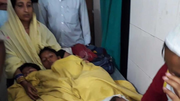 Some of the passengers at a medical facility after they were rescued by the NDRF from a river in Sitamarhi in Bihar.(HT PHOTO)