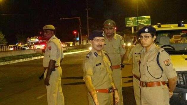 Gautam Budh Nagar senior superintendent of police Love Kumar and SP (rural) Suniti are seen at the spot after the gunfight between the suspected robbers and police teams. (HT Photo) Gautam Budh Nagar senior superintendent of police Love Kumar and SP (rural) Suniti are seen at the spot after the gunfight between the suspected robbers and police teams. (HT Photo)